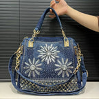 Elegant floral embroidered denim handbag with chain handle
