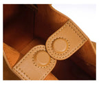 Designer-inspired suede handbag