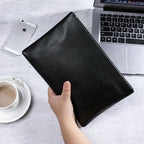 Leather clutch with wrist strap