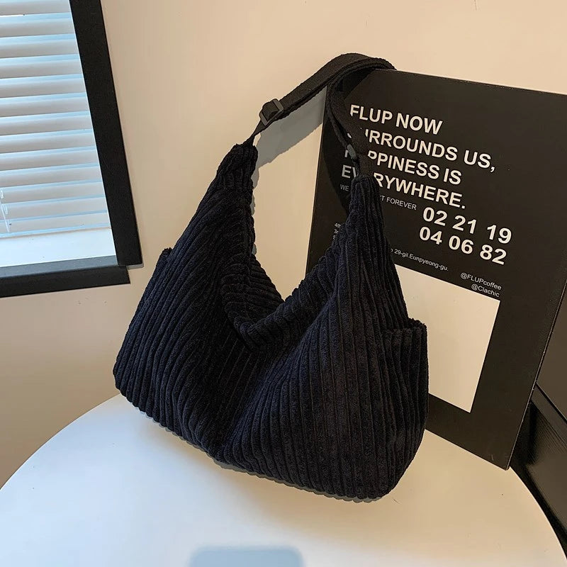 Versatile corduroy handbag with shoulder strap