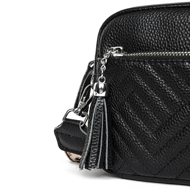 Textured leather crossbody bag