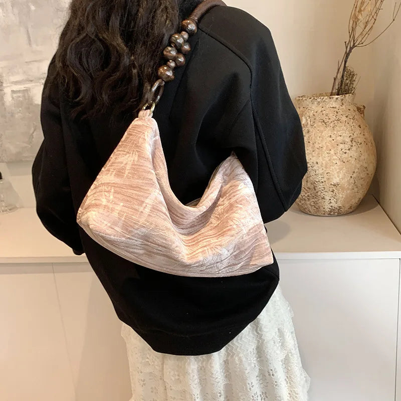 Corduroy handbag with wooden bead handle
