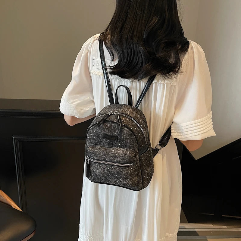 Women's small denim backpack
