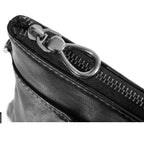 Minimalist leather clutch with detachable strap