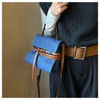 Elegant denim clutch bag for evening looks