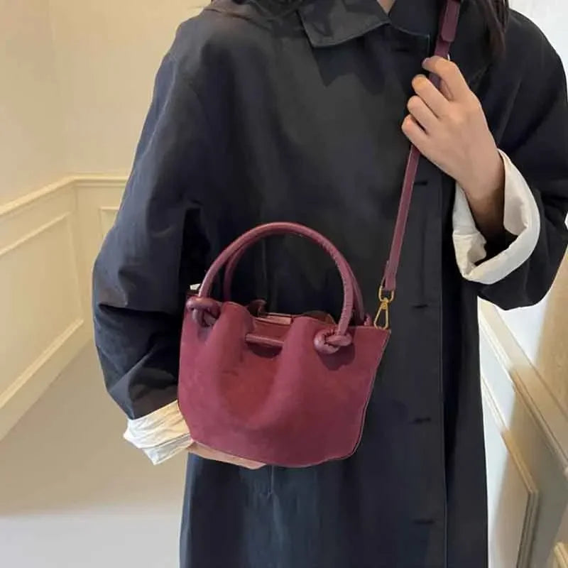 Everyday suede handbag with strap