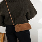 Rectangular suede purse with shoulder straps