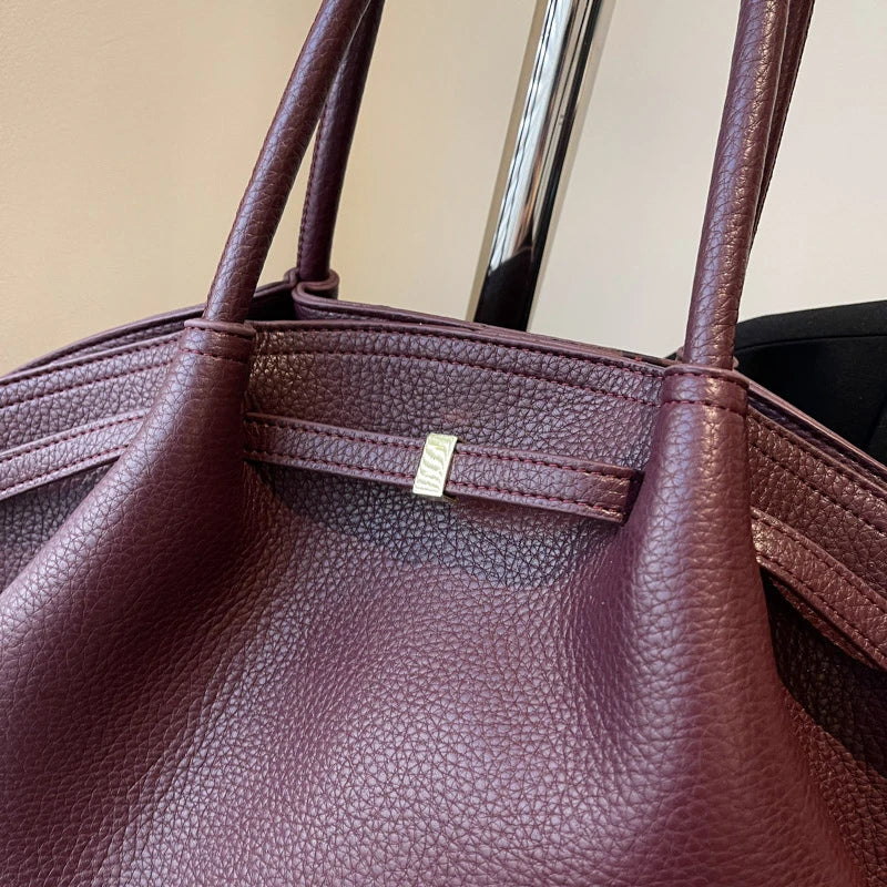 Versatile leather handbag