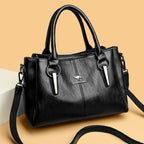 Leather handbag with detachable shoulder strap