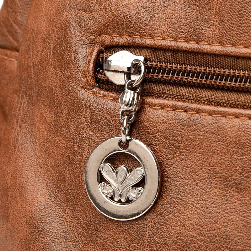 Leather shoulder bag with side pockets