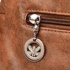 Leather shoulder bag with side pockets