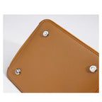 Designer-inspired suede handbag
