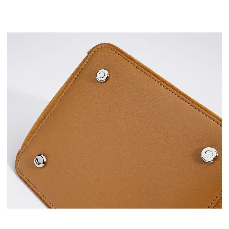 Designer-inspired suede handbag