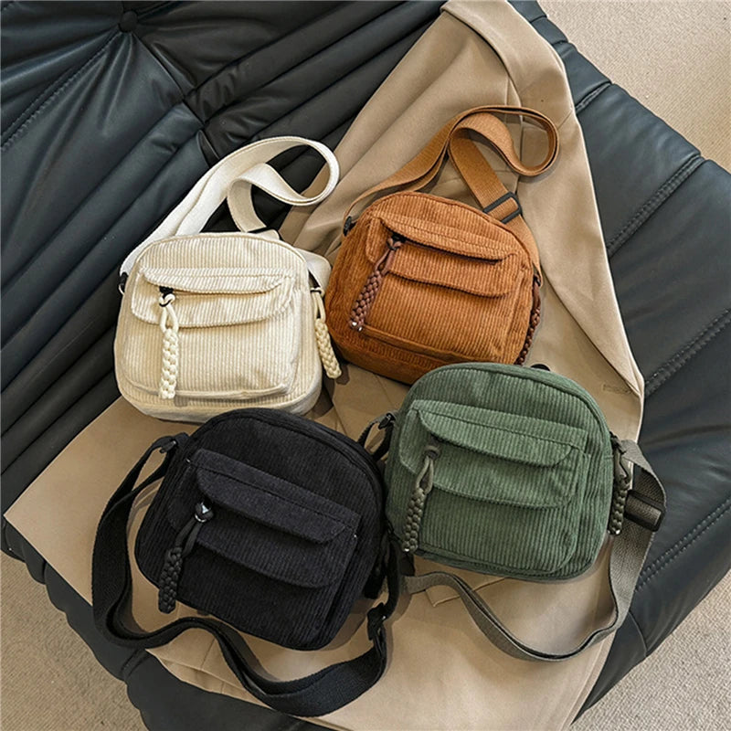 Small corduroy handbag with front zipper pocket
