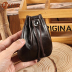 Compact drawstring pouch in leather