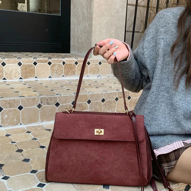 Structured modern suede handbag
