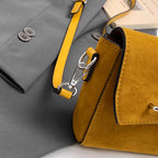 Structured suede handbag with minimalist shape