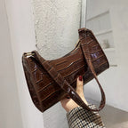 Small leather sling pouch