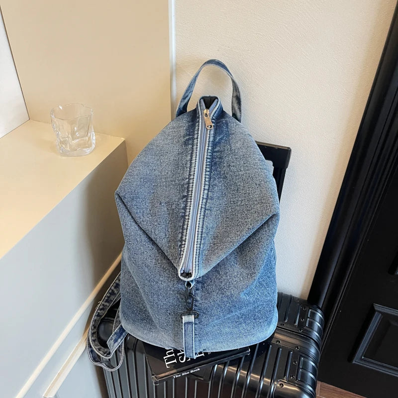 Washed denim backpack with adjustable straps