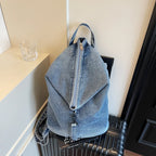 Washed denim backpack with adjustable straps