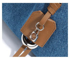 Denim handbag with external pockets