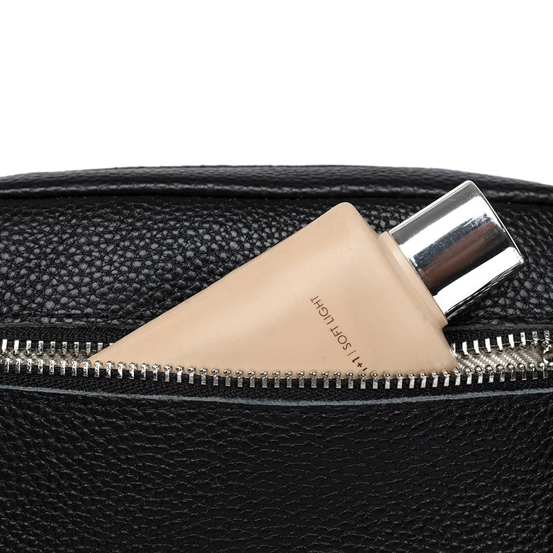 Textured leather crossbody bag