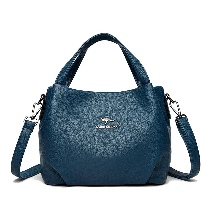 Leather handbag with wide base