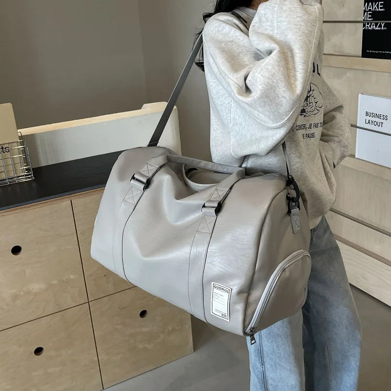 Slim leather duffle bag