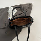 Soft-touch leather shoulder bag