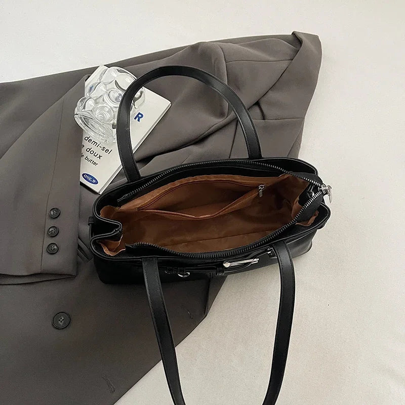 Soft-touch leather shoulder bag