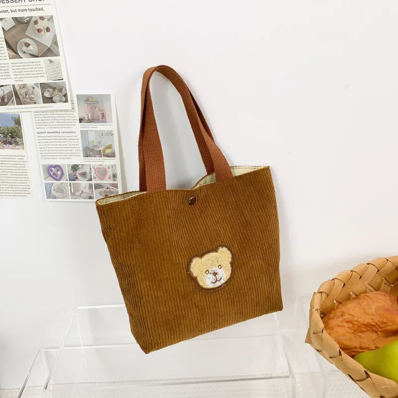 Women’s corduroy shoulder tote bag with front patch