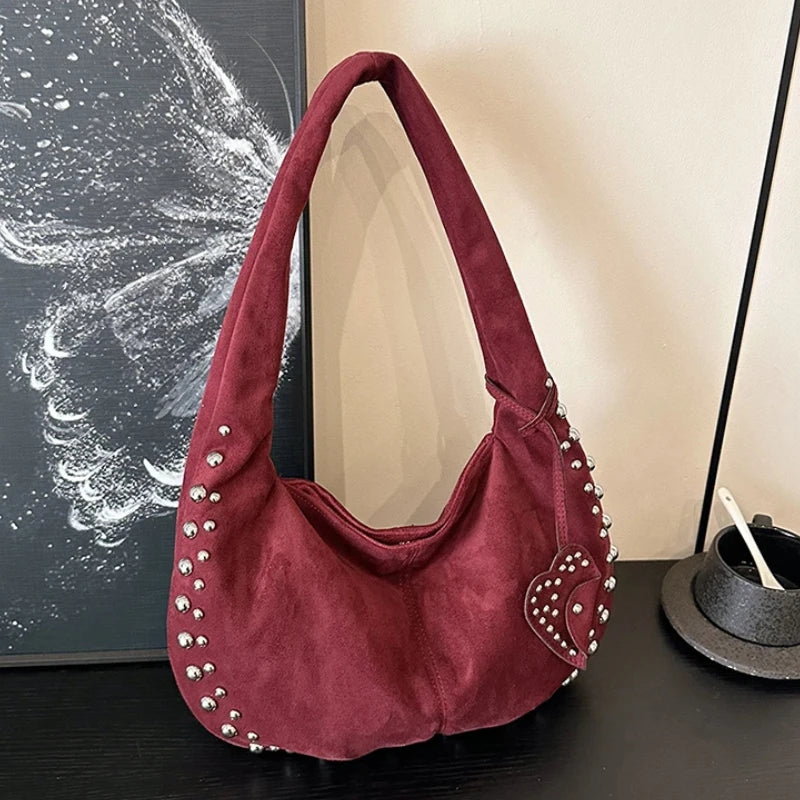 Chic suede shoulder bag with decorative strass