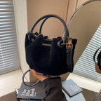 Everyday suede handbag with strap