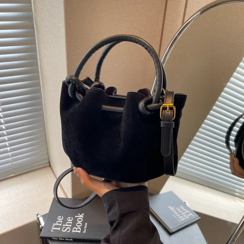 Everyday suede handbag with strap