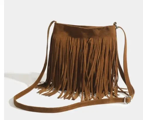 Classic suede shoulder bag with soft silhouette
