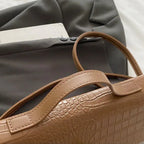 Compact leather handbag