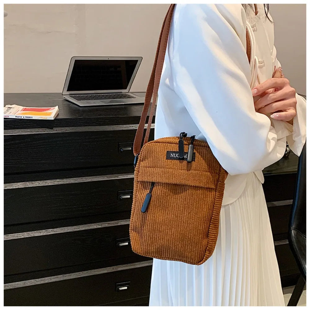 Compact corduroy crossbody bag