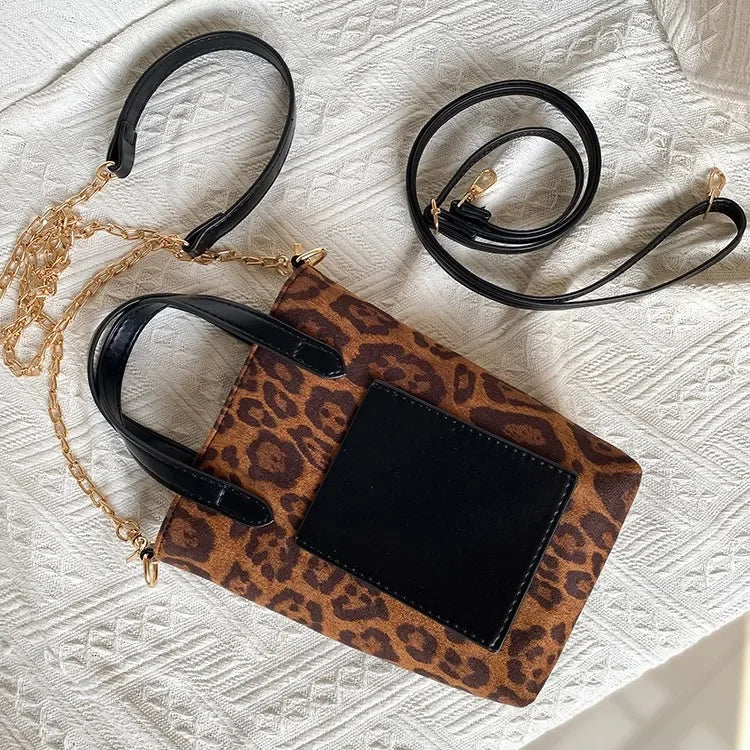 Two-tone suede purse with leather accents