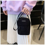 Compact corduroy crossbody bag