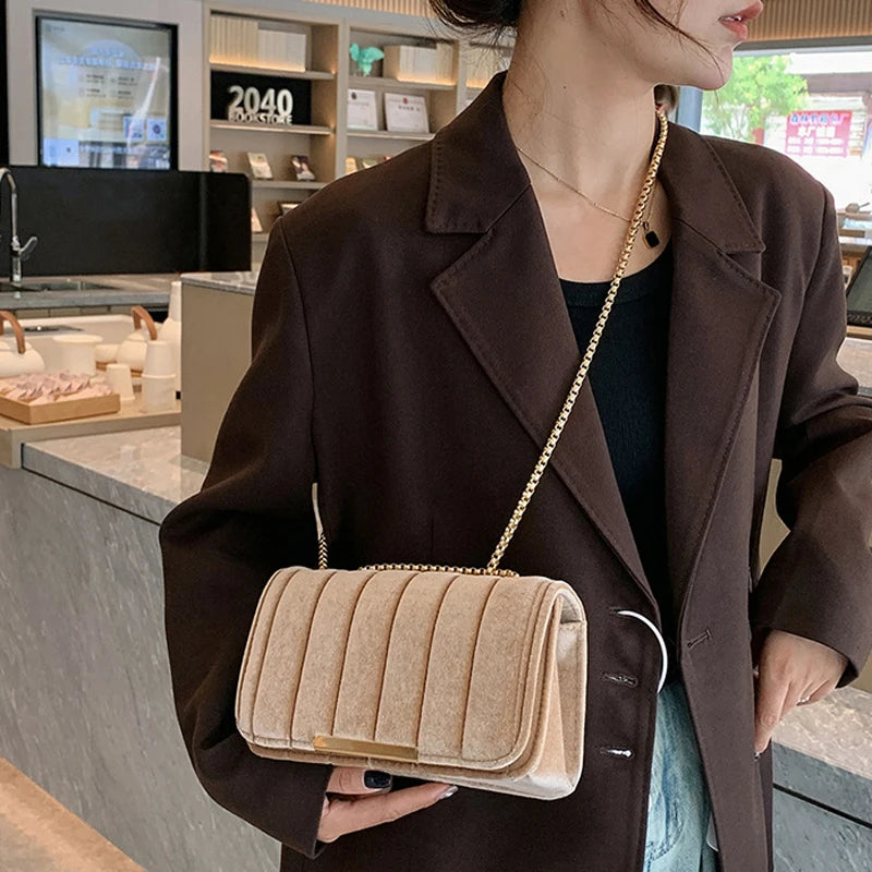 Luxury corduroy handbag with gold chain strap