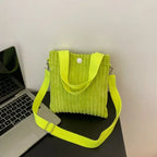 Corduroy handbag with front button detail