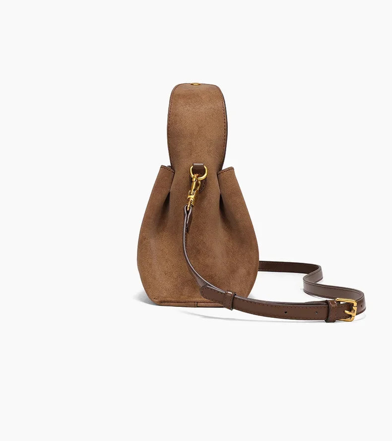 Suede handbag with rounded handles and zip closure