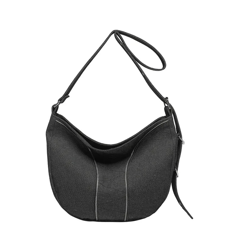 Soft washed denim shoulder bag with casual fold design