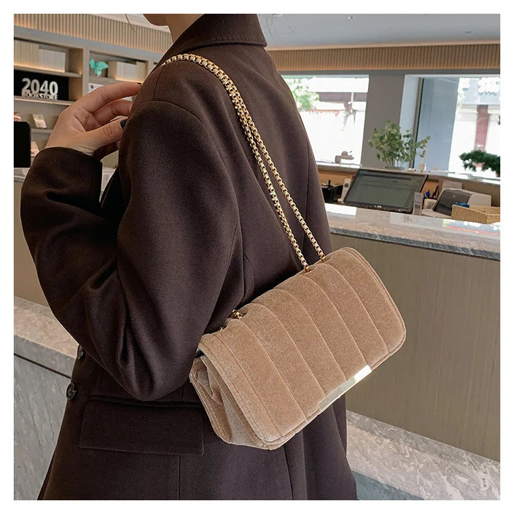 Luxury corduroy handbag with gold chain strap