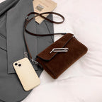 Structured suede handbag with minimalist shape