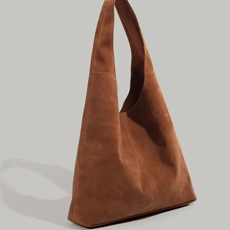 Suede hobo slouch bag with wide handle strap