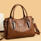 Leather handbag with detachable shoulder strap