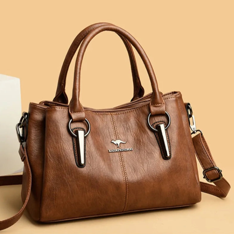 Leather handbag with detachable shoulder strap