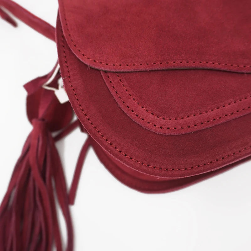 Fold-over suede shoulder bag