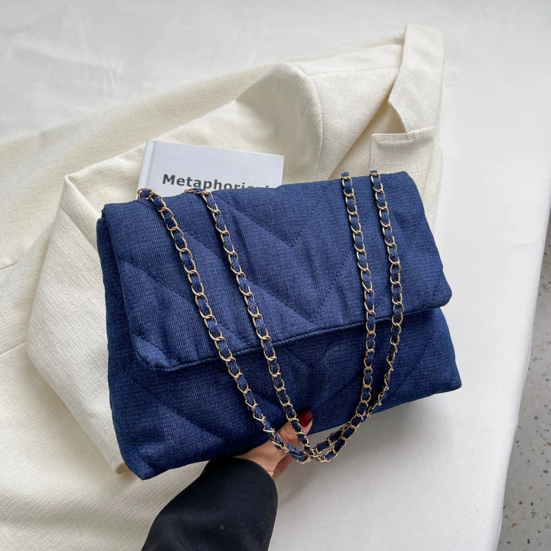 Flap-style denim shoulder handbag